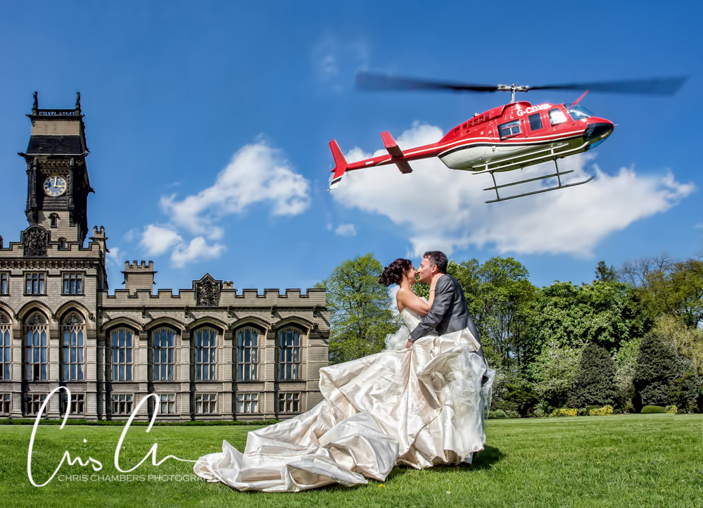Carlton Towers wedding photography, bride and groom with a helicopter at Carlton towers wedding venue. 