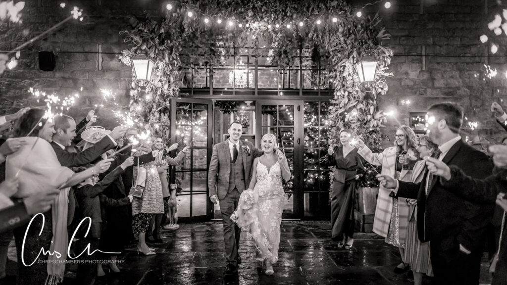 bride and groom with sparklers at Wharfedale Grange West Yorkshire