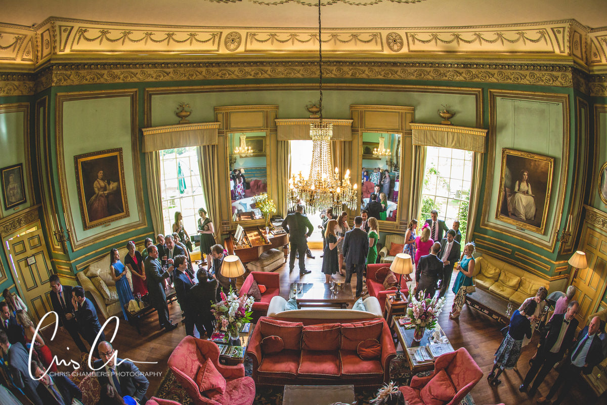 Drinks reception wedding photo taken in the drawing room. North yorkshire. Swinton Park Wedding Photograph