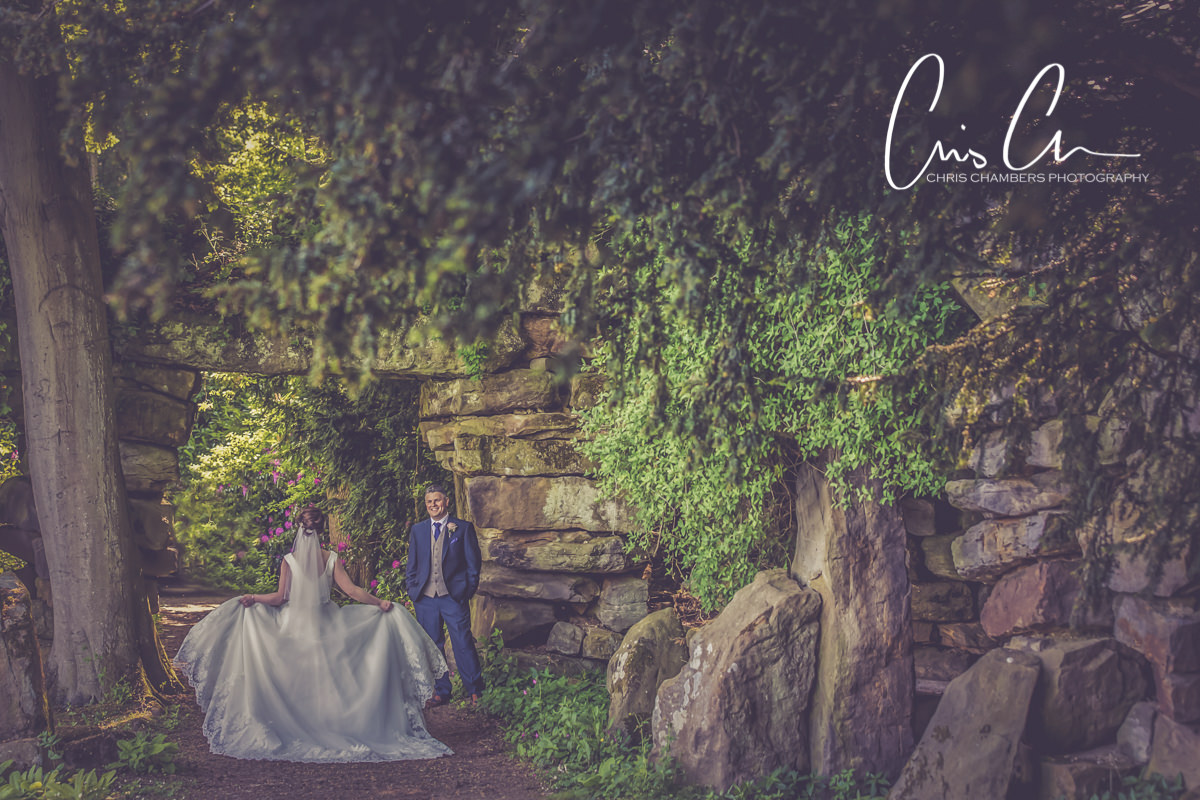Bride and groom photo showing the brides dress. Swinton Park Wedding Photograph