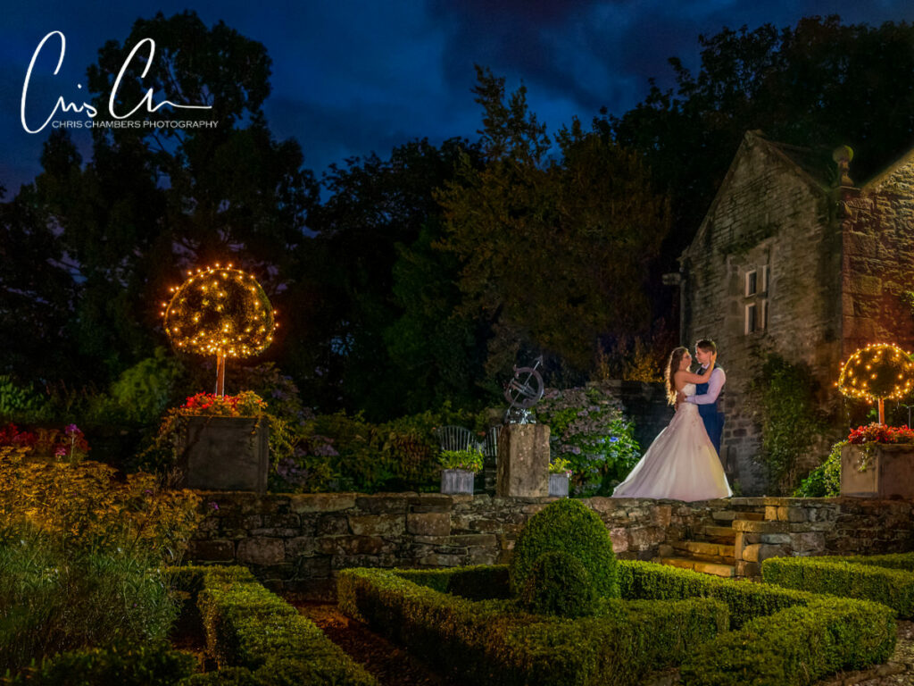 Bride and groom at Holdwworth House at night. West Yorkshire wedding venue - Chris Chambers Photography