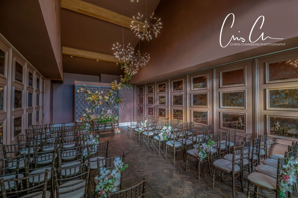 Elegant wedding venue interior with floral decorations. Manor House Lindley.