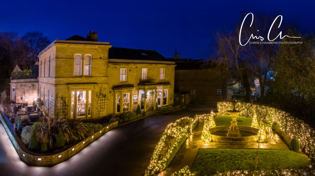 Outside view of Manor House Lindley at twilight.