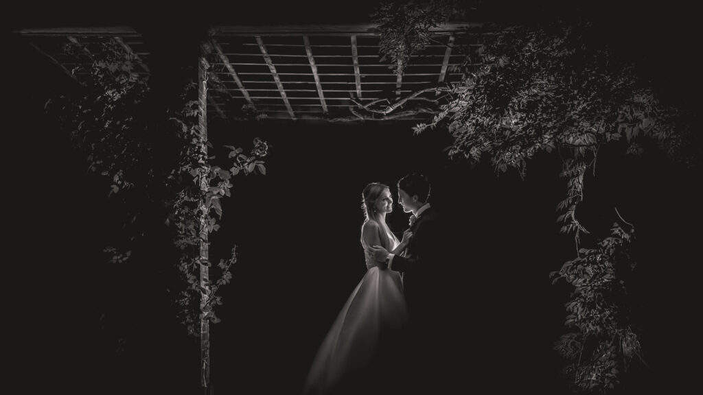 Couple embracing at night wedding photography. Chris Chambers Yorkshire wedding photographer