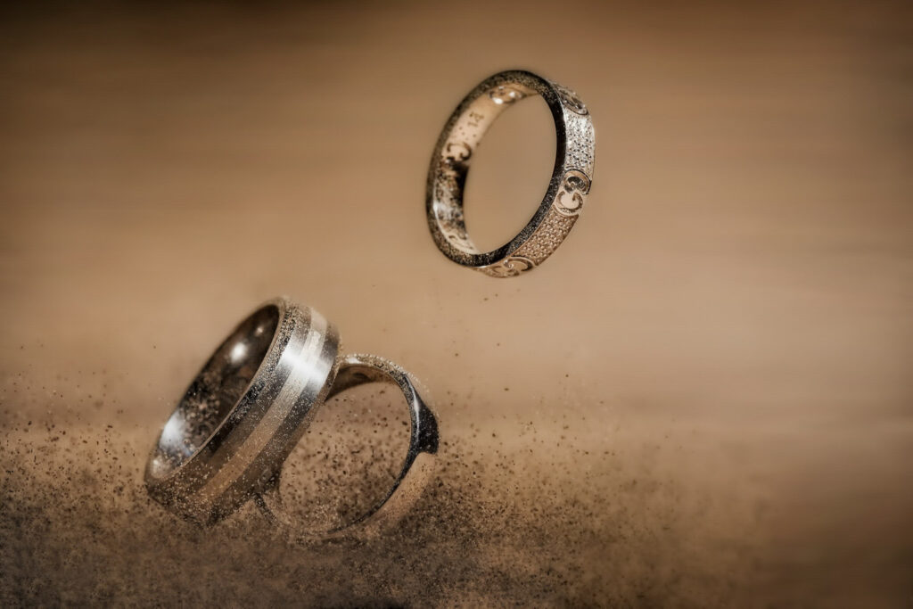 Wedding rings photograph. Dramatic photo of three rings