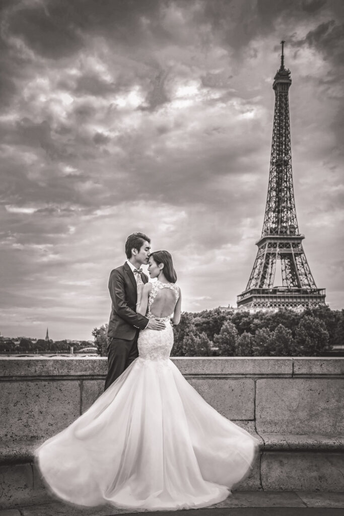 wedding photo with Eiffel Tower backdrop.