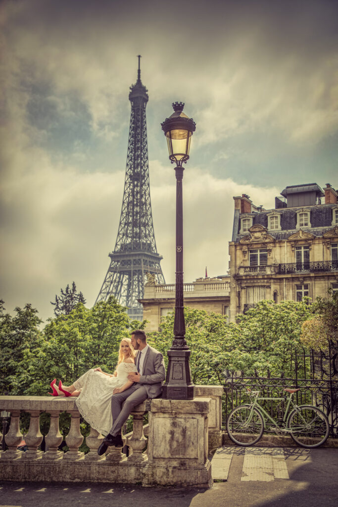 Couple enjoying view of Eiffel Tower in this Paris wedding photograph
