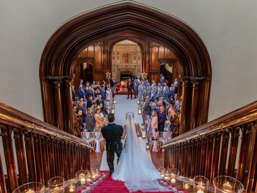 Allerton Castle wedding photograph of bride entering the great hall for the wedding ceremony