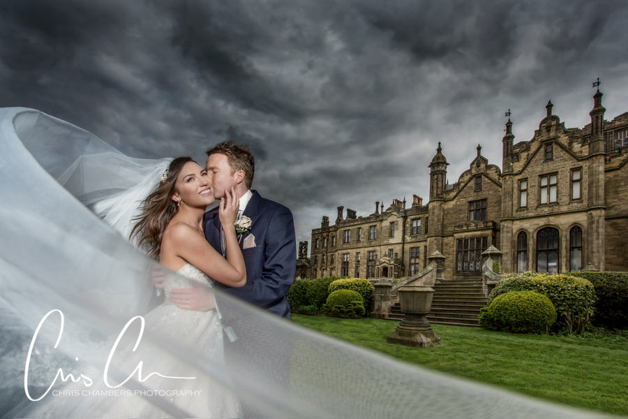 Allerton Castle Wedding Photography, bride and groom outside the castle in North Yorkshire. 