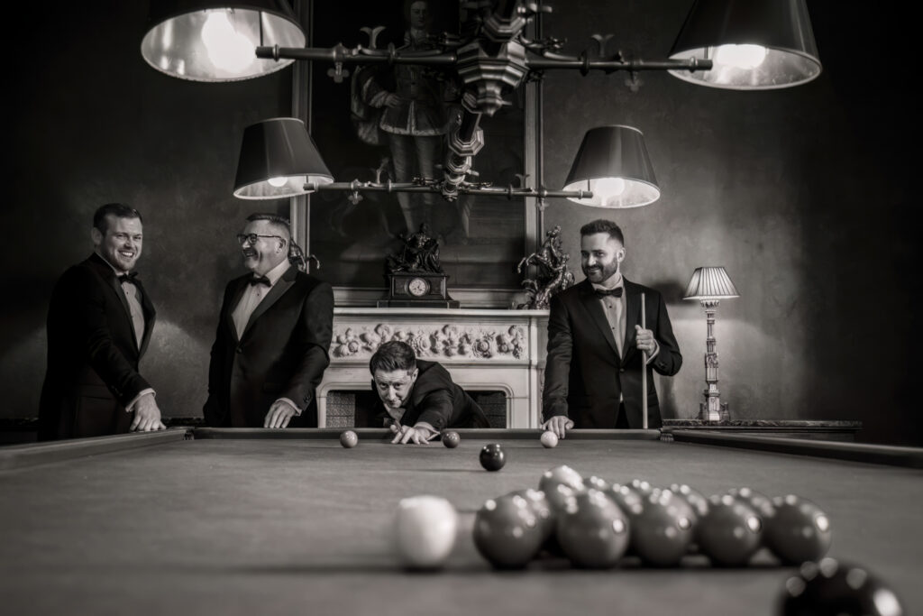 Men in suits playing billiards, Allerton Castle wedding photographs