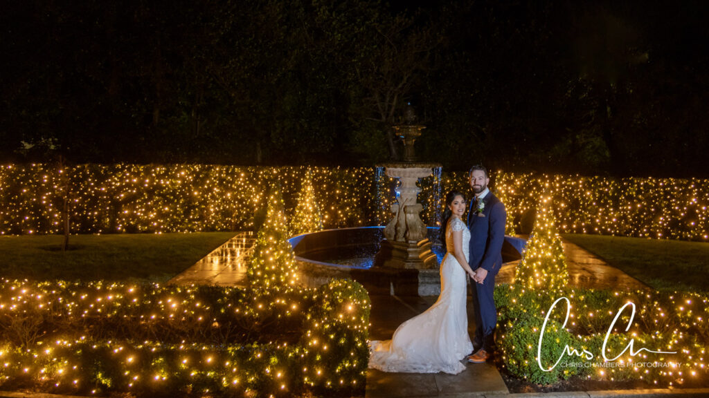 Manor House Lindley weddings. at night wedding, illuminated garden and fountain.