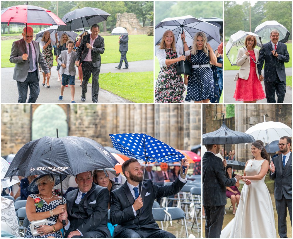 preparing for wet weddings - umbrellas at a wedding