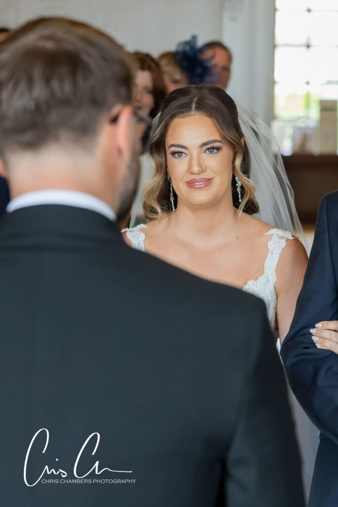 Wedding ceremony in the old Dining room at Hazlewood castle.