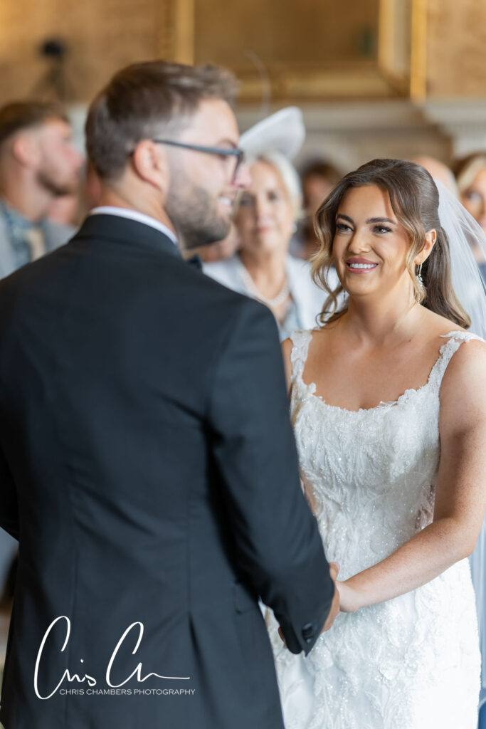 Wedding ceremony in the old Dining room at Hazlewood castle.