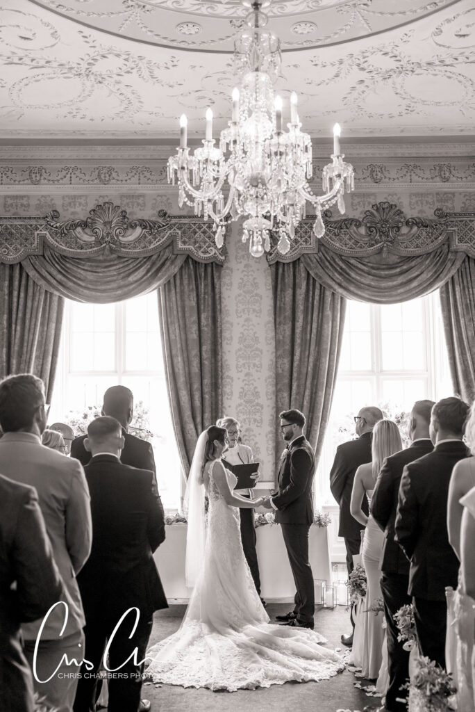 Wedding ceremony in the old Dining room at Hazlewood castle.