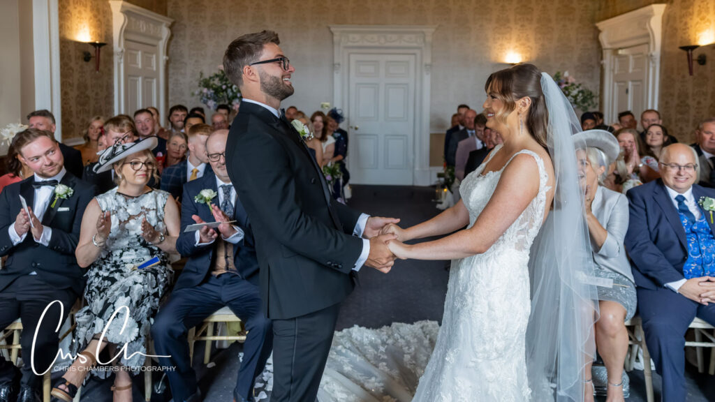 Wedding ceremony in the old Dining room at Hazlewood castle.