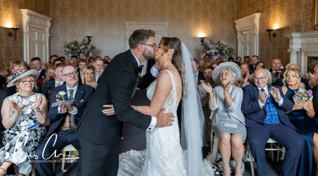 Wedding ceremony in the old Dining room at Hazlewood castle.