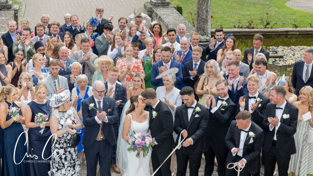 big group photo at Hazlewood castle. all the wedding guests