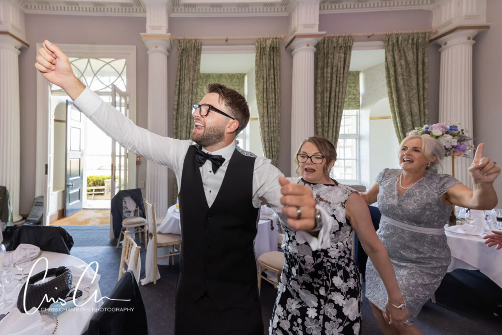 wedding breakfast and singing waiters at Hazlewood Castle