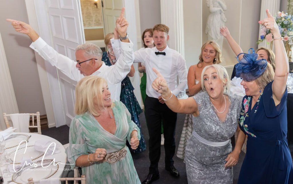 wedding breakfast and singing waiters at Hazlewood Castle