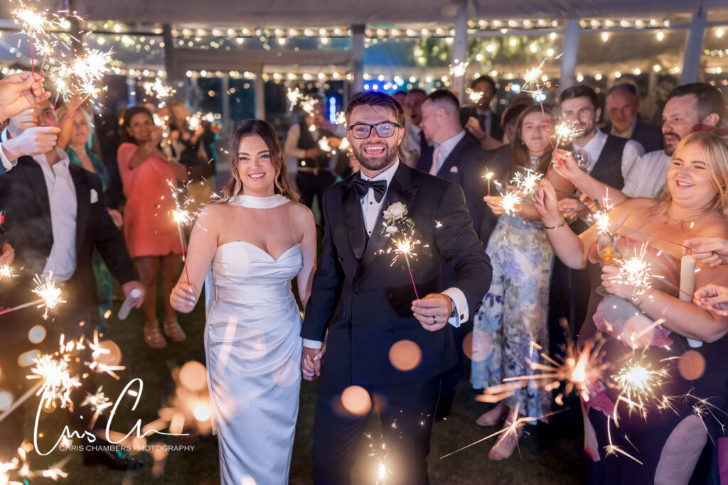 Wedding Sparklers. Bride and groom at night with Sparklers